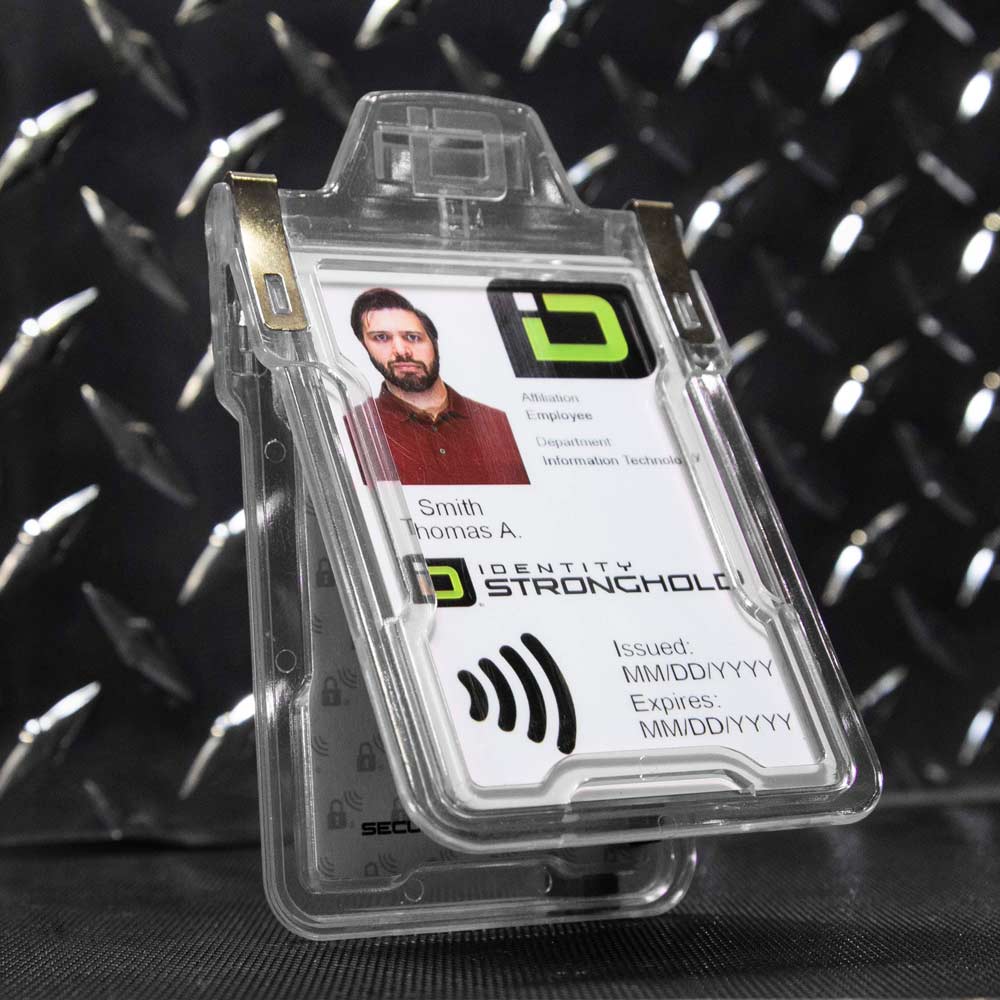 Clear RFID-blocking badge holder securely displaying an employee ID card .