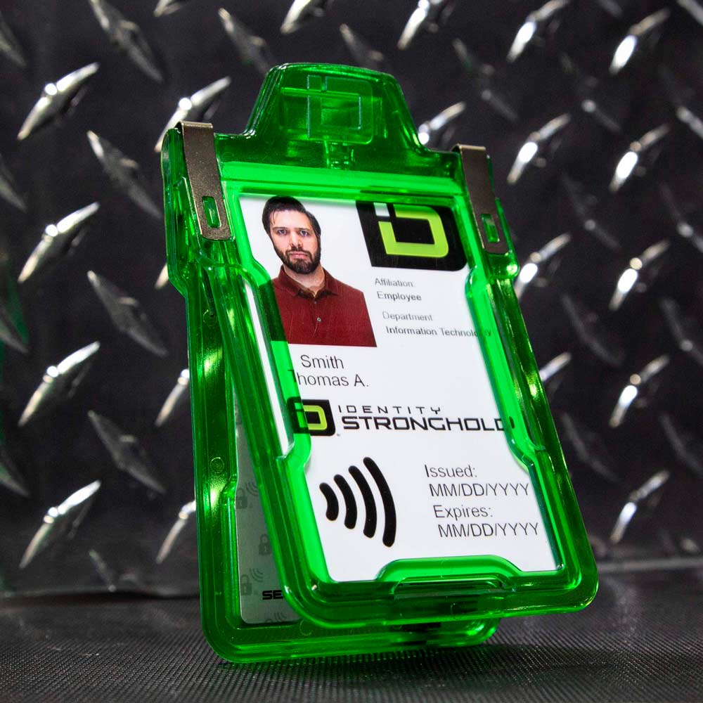 Green RFID-blocking badge holder securely displaying an employee ID card .