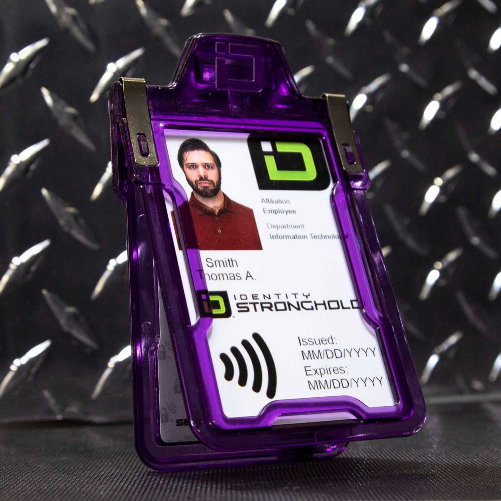 Purple RFID-blocking badge holder securely displaying an employee ID card .